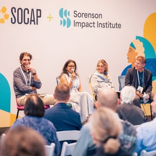 Photo of speakers on stage at SOCAP25